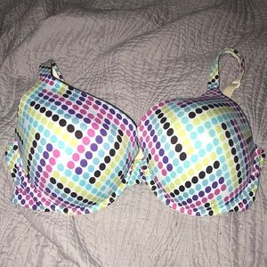 Victoria secret full coverage uplift size 36 DD bra that has Polka dots on it.